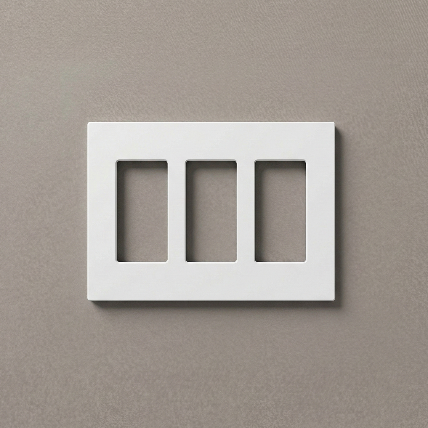 Matte White 1-Gang Variant: Front-facing view of a one-gang screwless Decora wall plate in a matte white finish, showcasing a clean, monolithic design with no visible mounting hardware against a white background.