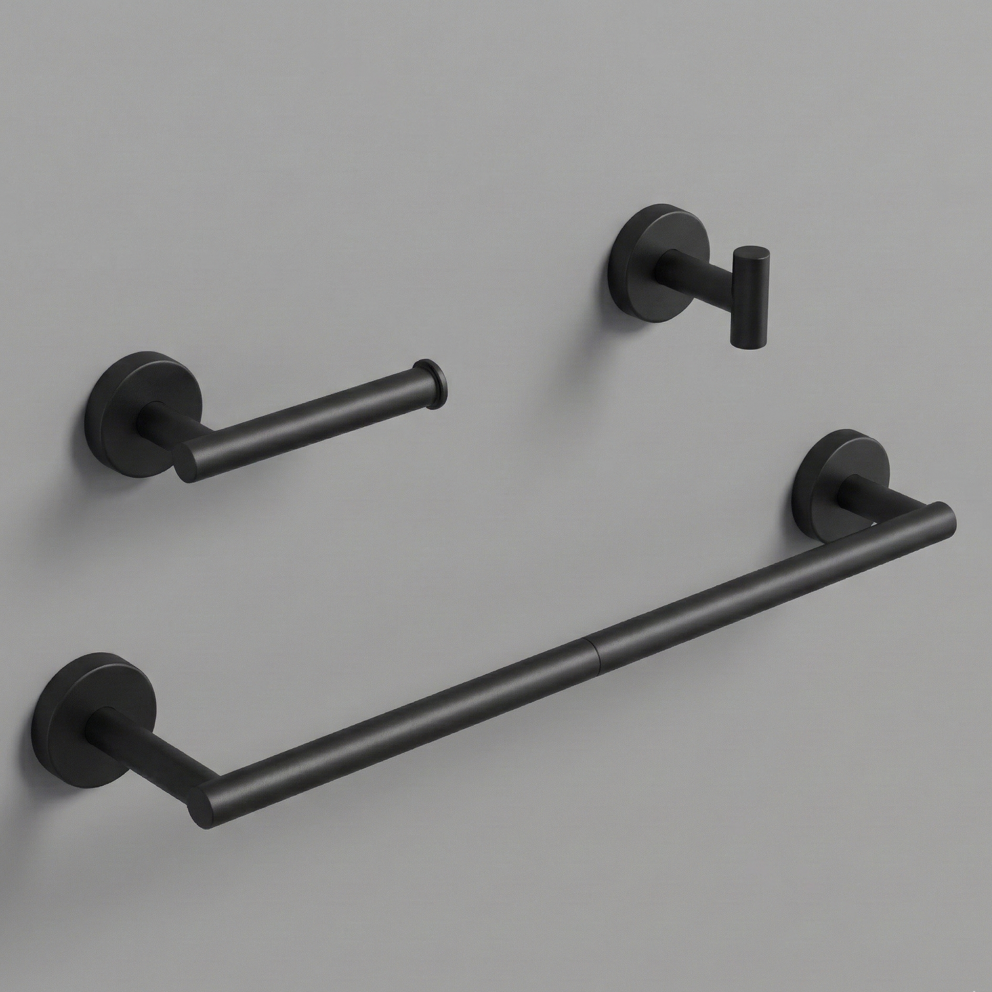 A luxurious, three-piece modern bathroom hardware set in a Matte balck finish, featuring a sleek 24-inch round towel bar, an anti-spin single-post toilet paper holder, and a minimalist cylindrical robe hook floating against a soft, neutral beige background.