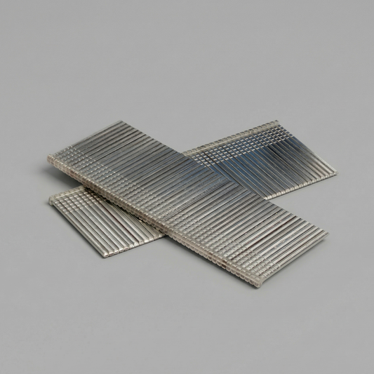 Two packs of metal nails on a gray background