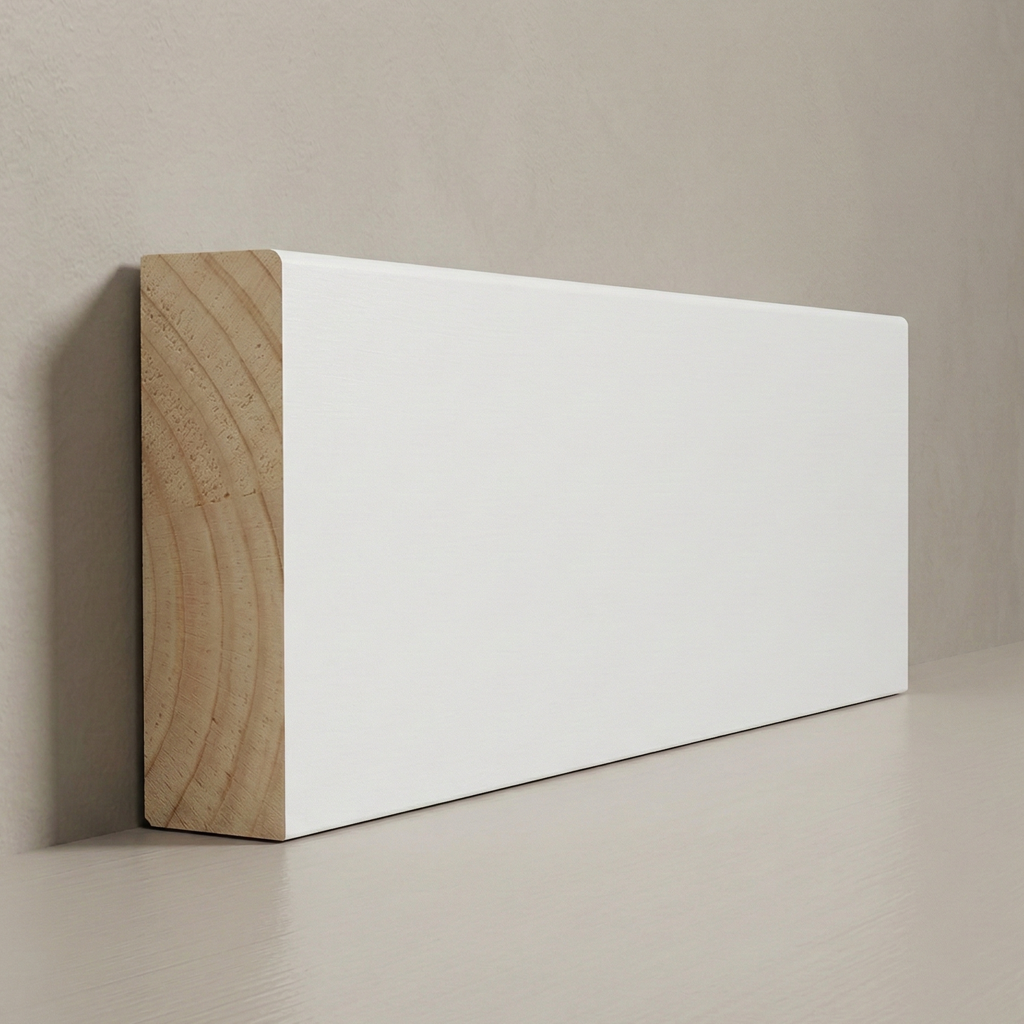 Architectural cross-section of 1-1/4 inch Solid Pine Colonial Doorstop showing natural wood grain and decorative tiered profile.