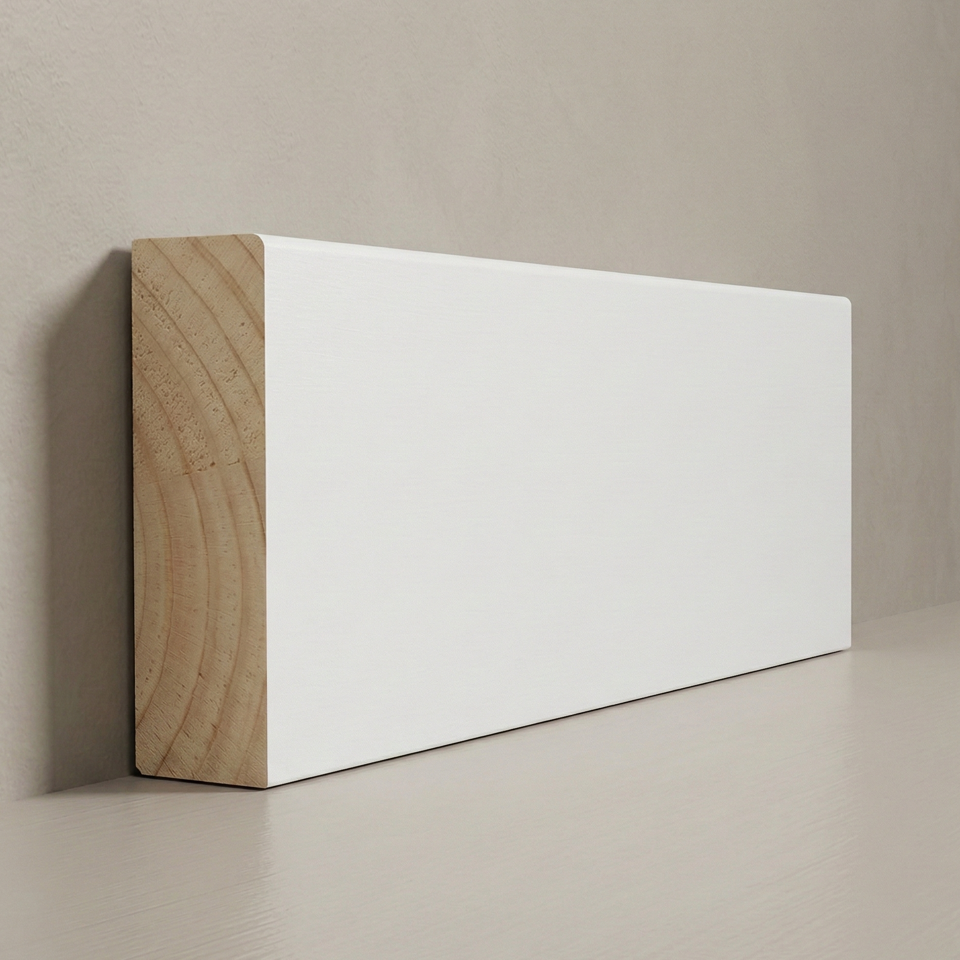 Architectural cross-section of 1-1/4 inch Solid Pine Colonial Doorstop showing natural wood grain and decorative tiered profile.