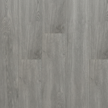 Gray wood-patterned flooring with a starburst design element.