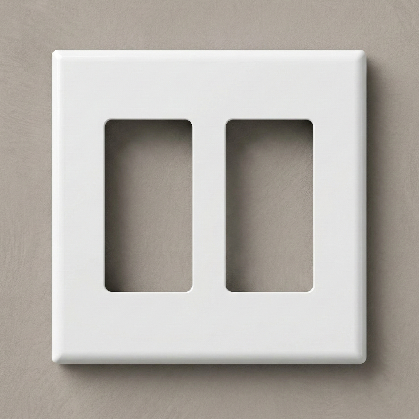 Matte White 2-Gang Variant: Front-facing view of a one-gang screwless Decora wall plate in a matte white finish, showcasing a clean, monolithic design with no visible mounting hardware against a white background.