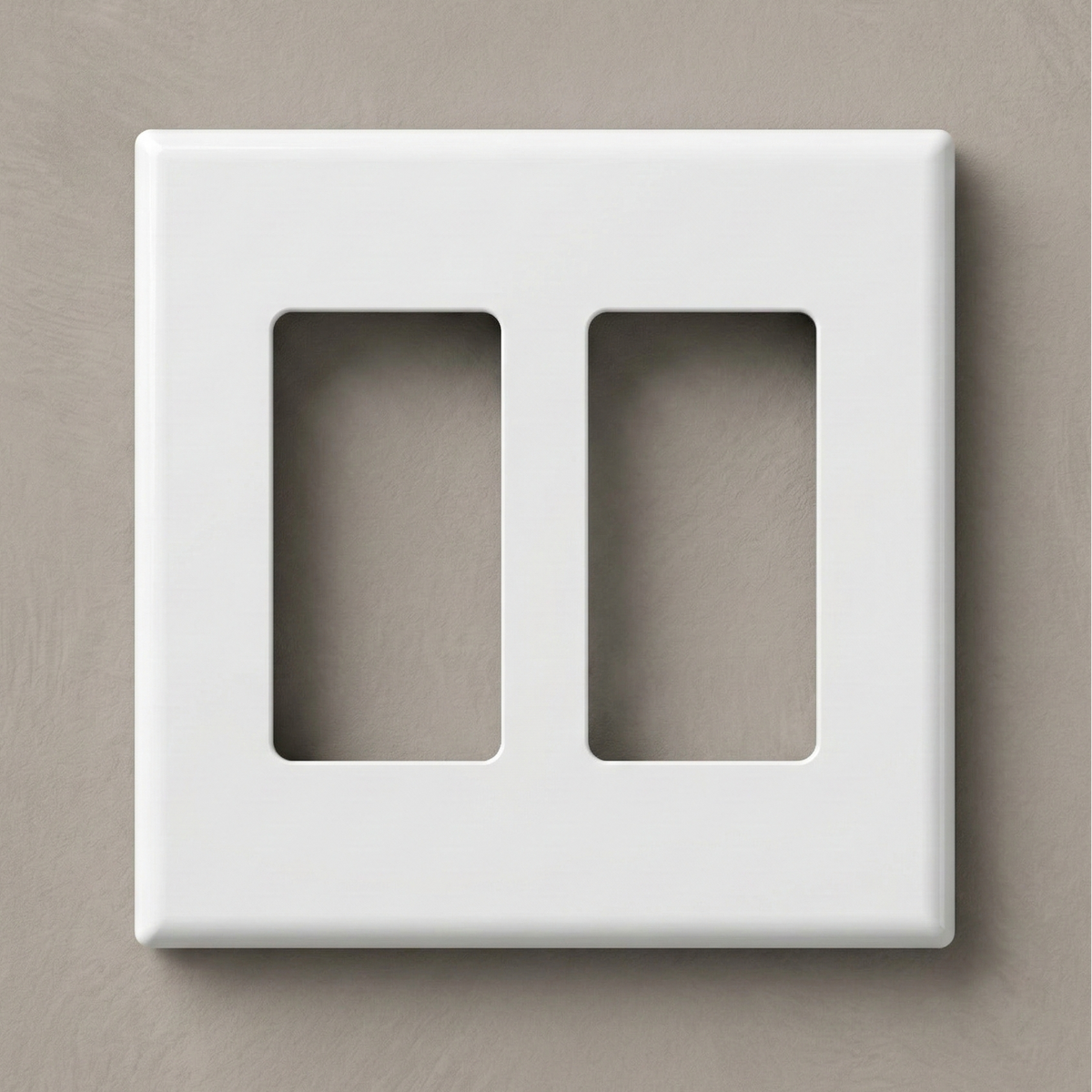 Matte White 2-Gang Variant: Front-facing view of a one-gang screwless Decora wall plate in a matte white finish, showcasing a clean, monolithic design with no visible mounting hardware against a white background.